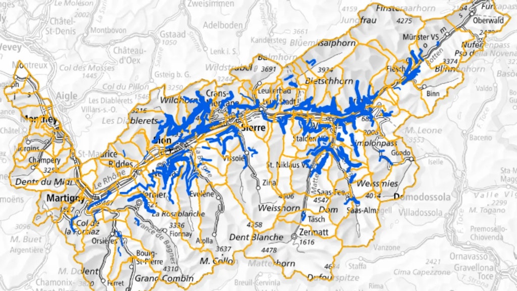 Map of the canton of Valais showing bisses marked in blue across valleys and mountains, with place names and relief in the background.