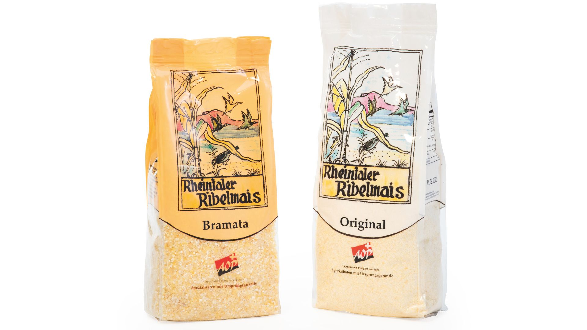 Two 500 g bags of Rheintaler Ribelmaïs AOP, one labelled "Bramata" with coarse grind, the other "Original" with traditional fine semolina.